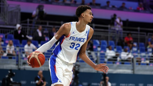 Victor Wembanyama on the floor for Team France at the Olympics.