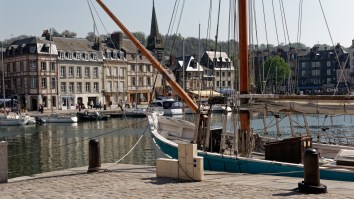 French Dudes Completely Wipe Out While Failing To Run Up Slippery Pole At 2024 Mat Incliné A Honfleur