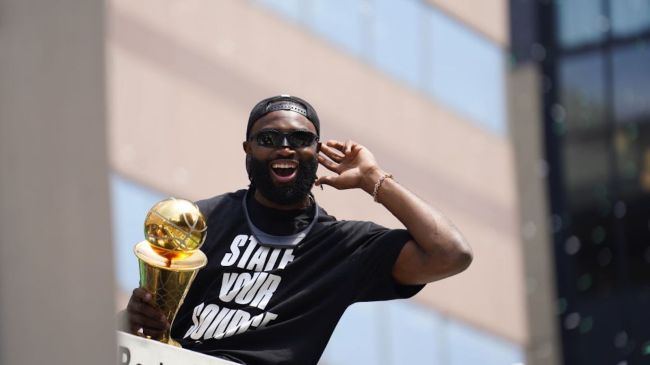 jaylen brown celebrating with nba finals mvp trophy