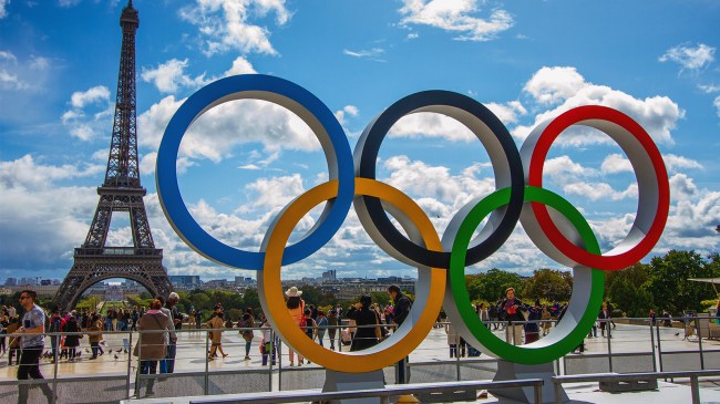 olympic rings in front of eiffel tower