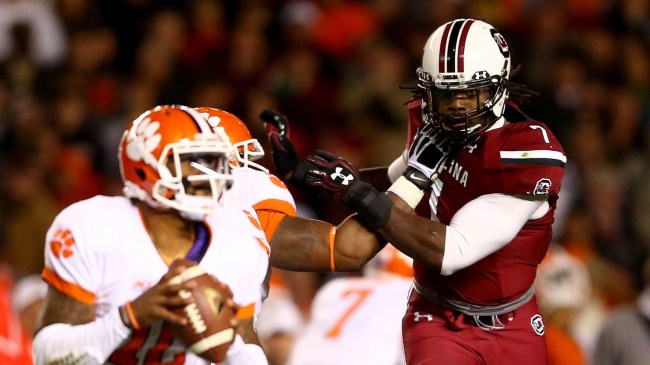 South Carolina defender Jadeveon Clowney rushes Clemson QB Tajh Boyd.