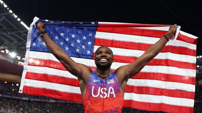 Noah Lyles celebrates after winning gold in the 100m at the Paris Olympics.