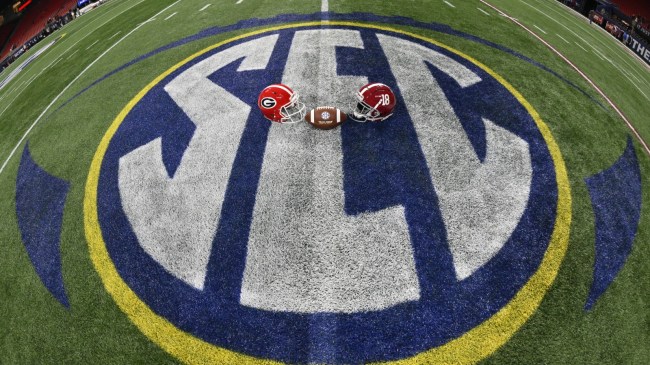 Georgia and Alabama helmets at midfield before the SEC Championship Game.