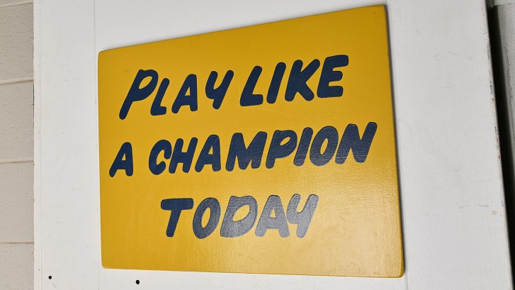 Play Like A Champion Today sign