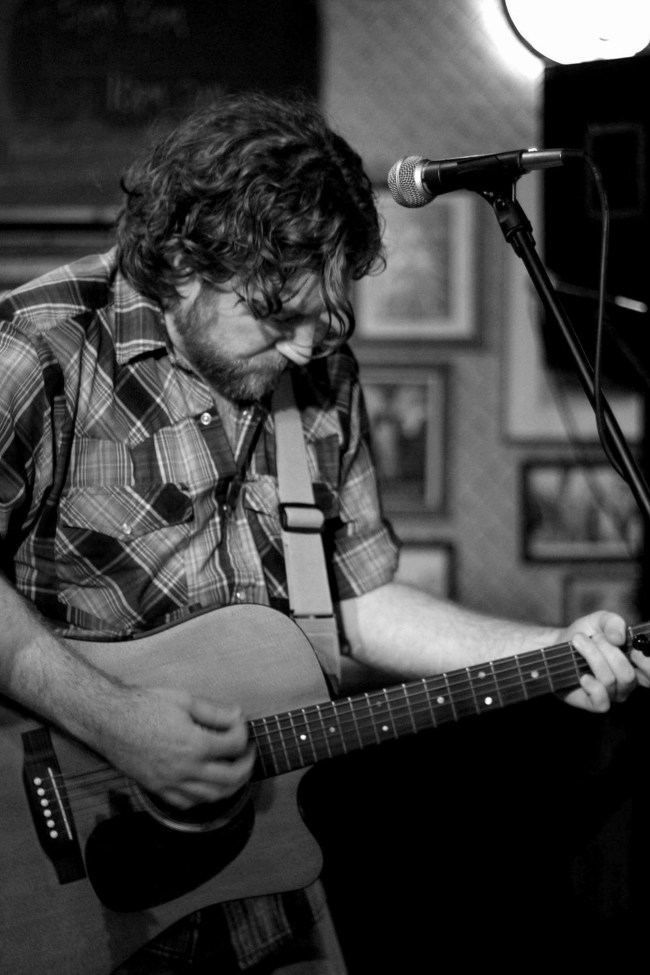 Dana Anderson playing guitar