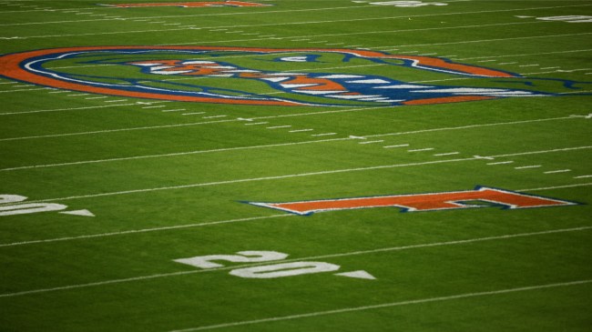 A Florida Gators logo at midfield before a football game against Florida State.
