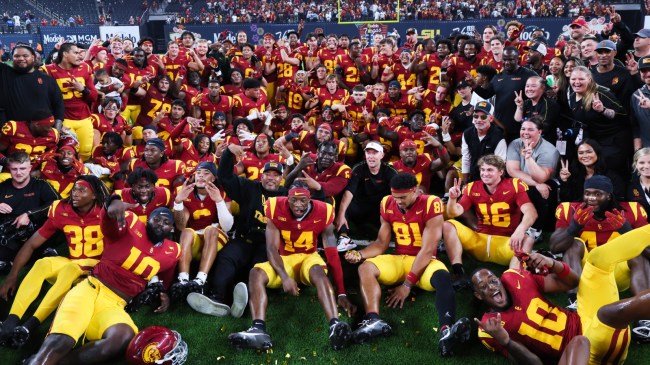 The USC Trojans football team poses for a photo after beating LSU.