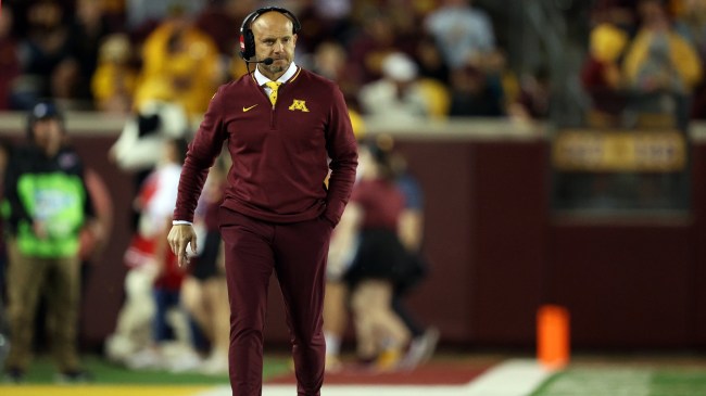 Minnesota football coach PJ Fleck walks the sidelines during a game vs. USC.