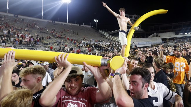 Vanderbilt football fans storm the field after a win over Alabama.