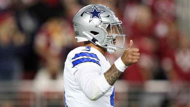 Dallas Cowboys QB Dak Prescott signals to the sidelines.