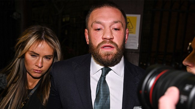 Conor McGregor leaves court accompanied by his partner Dee Devlin