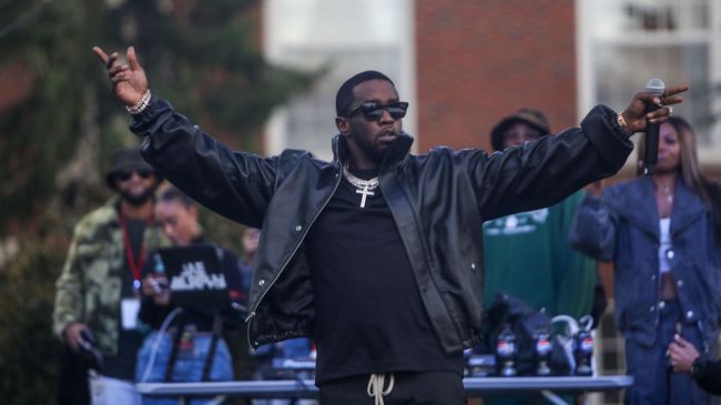 diddy performing in all black