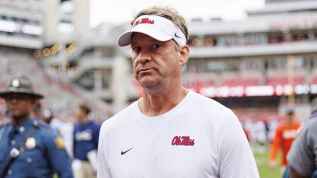 Ole Miss football coach Lane Kiffin walks off the field after a game.