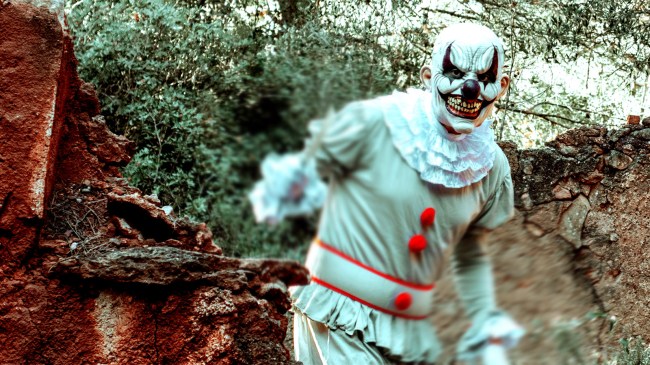 scary clown chasing someone