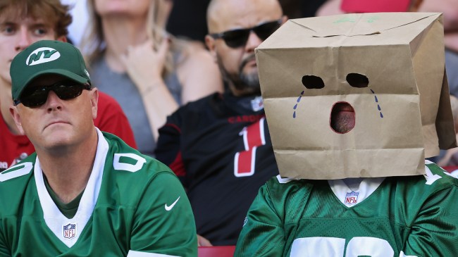 New York Jets fan wearing paper bag