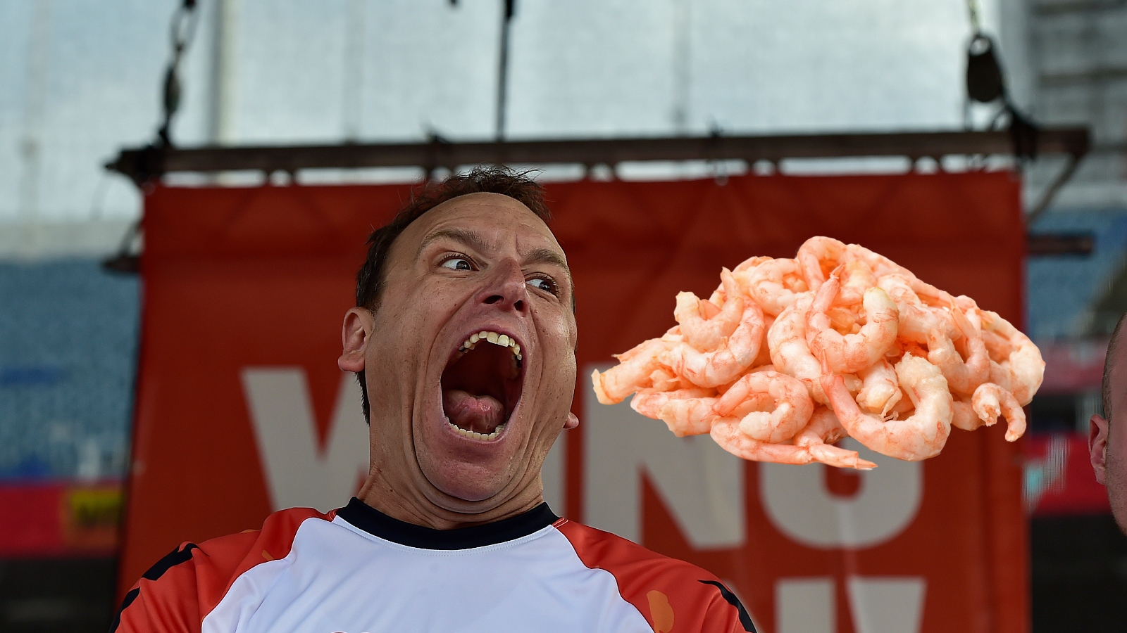 Joey Chestnut eating cocktail shrimp