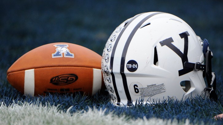 Yale helmet next to football