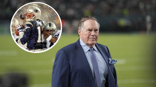 Bill Belichick walks on the field.