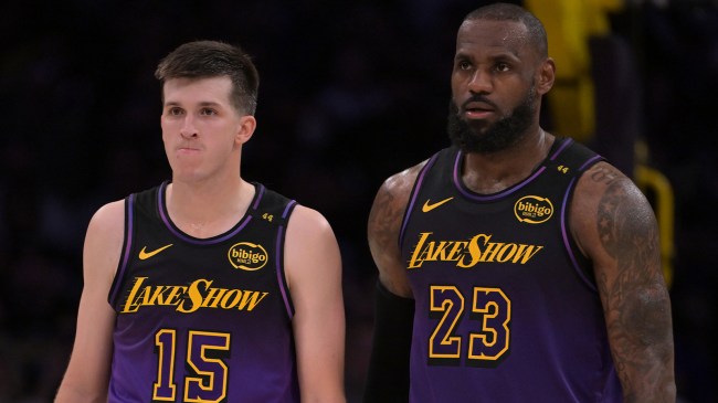 Austin Reaves and LeBron James wearing Lakers "Lake Show" alternate uniforms