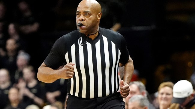 College basketball referee Jeffrey Anderson runs the floor.