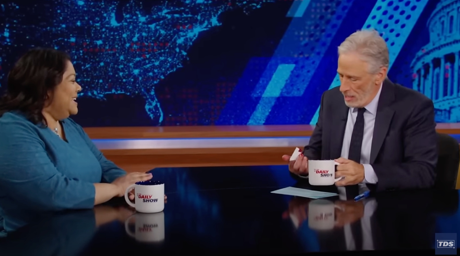 Jon Stewart shows off injured hand
