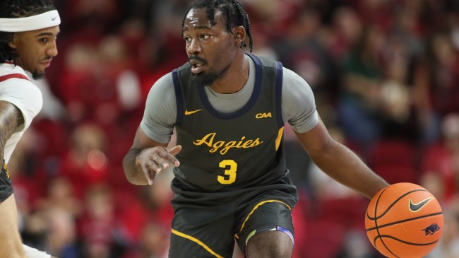 North Carolina A&T basketball player Camian Shell dribbles against Arkansas.