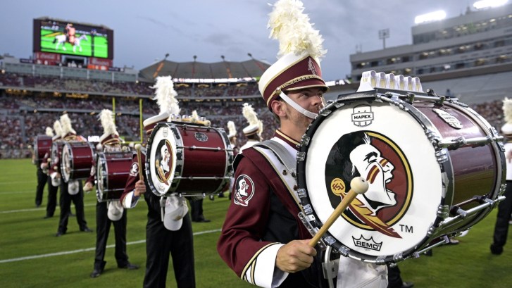 Florida State band members on the field at a football game