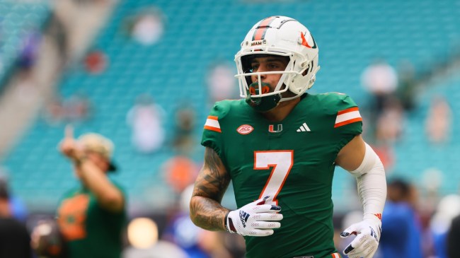 Miami WR Xavier Restrepo warms up before a game.