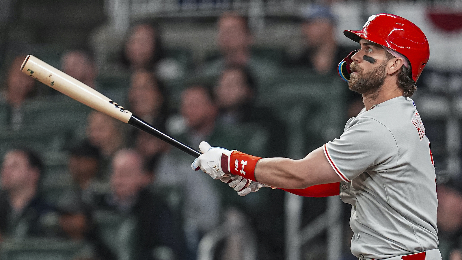 Apr 9, 2025; Cumberland, Georgia, USA; Philadelphia Phillies first base Bryce Harper (3) hits a two run home run against the Atlanta Braves during the seventh inning at Truist Park. Mandatory Credit: Dale Zanine-Imagn Images