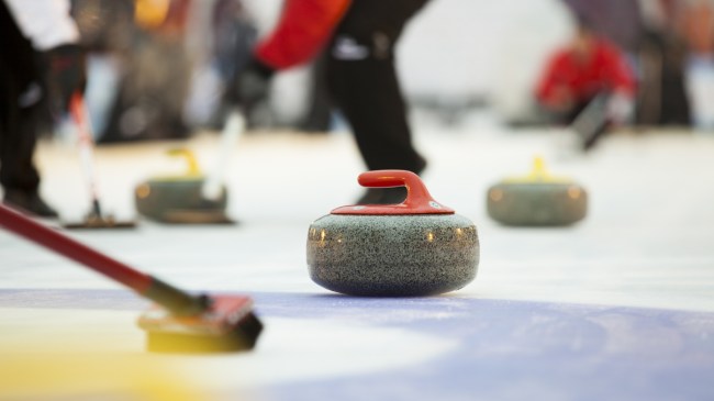 A stock image of players curling.