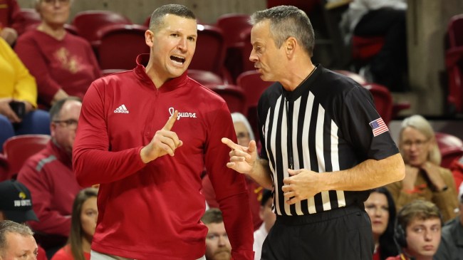 IU Indy basketball coach Paul Corsaro speaks with a referee.