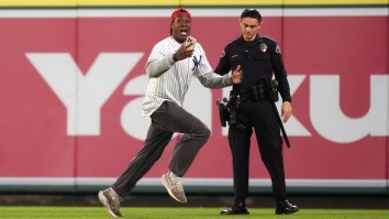 A Yankees Fan Who Ran Onto Field Thought He Had Escaped, Then Security Caught Him