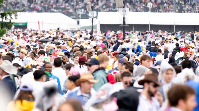 Fans gather on the infield at Churchill Downs for the Kentucky Derby.