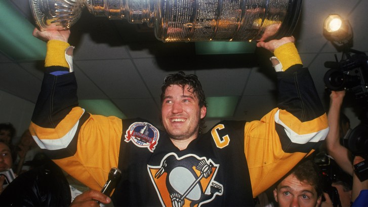 Mario Lemieux holding Stanley Cup