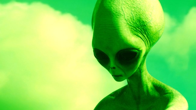 alien-staring-down-at-ground