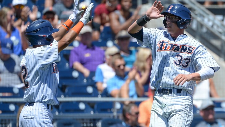 Cal State Fullerton baseball players celebrate
