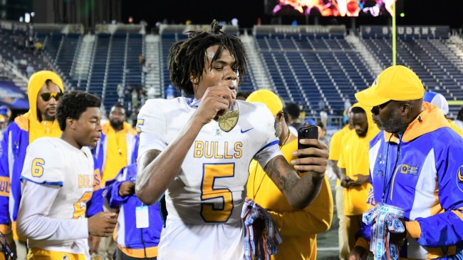 Miami Northwester wide receiver Calvin Russell poses for a selfie