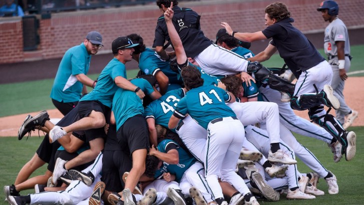 Coastal Carolina baseball players dogpile