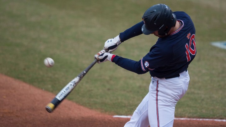 Edouard Julien swings at a pitch