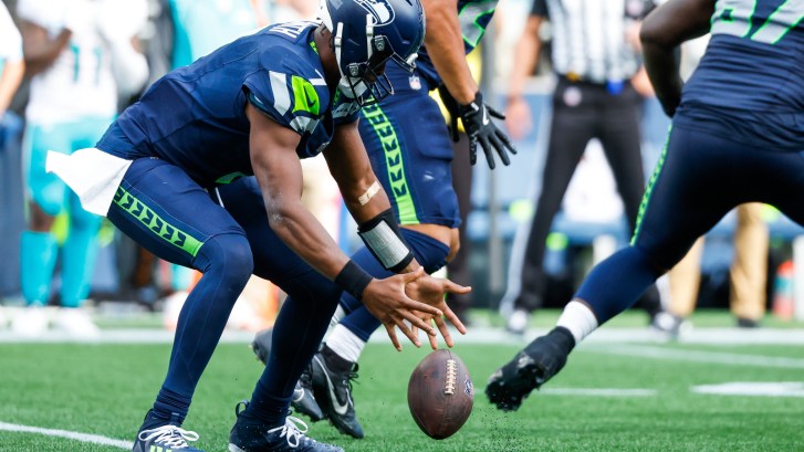 Geno Smith fumbles the ball