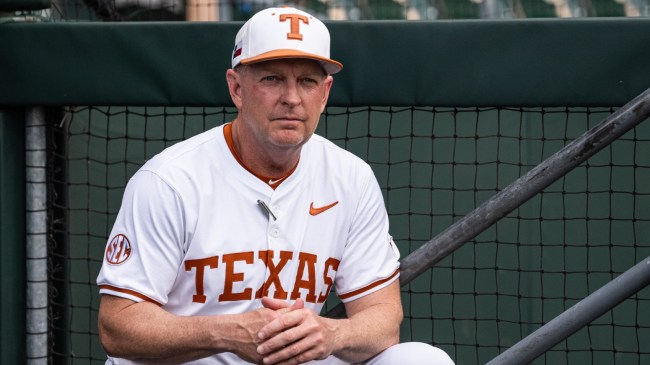 Texas baseball coach Jim Schlossnagle in the dugout during a game.