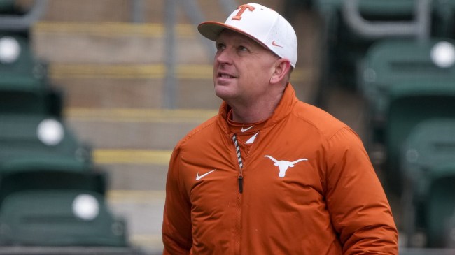 Texas baseball coach Jim Schlossnagle on the field.