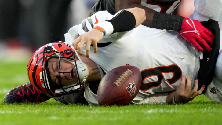 Joe Burrow fumbling the ball
