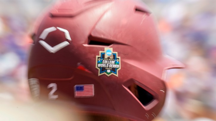College World Series logo on a Stanford helmet