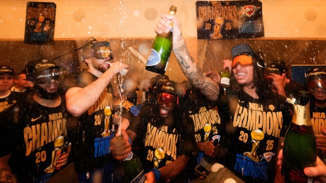 Thunder players pop champagne after winning NBA title