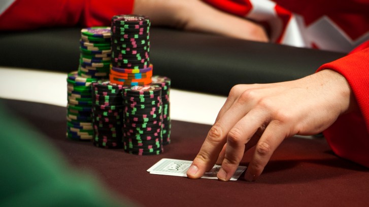 poker player with WSOP poker chips