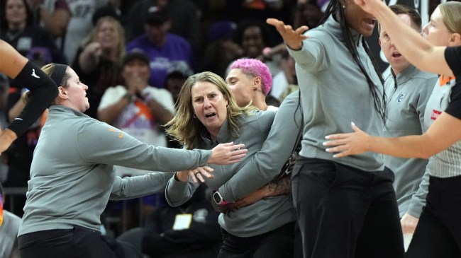 Minnesota-Lynx-head-coach-Cheryl-Reeve-is-held-back-after-being-ejected