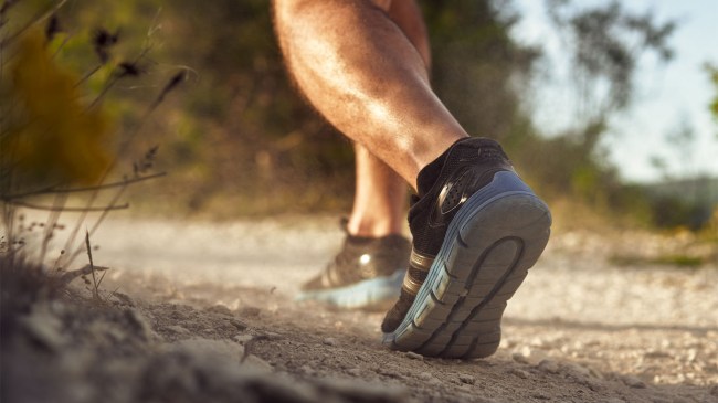 mans-legs-walking-up-hill