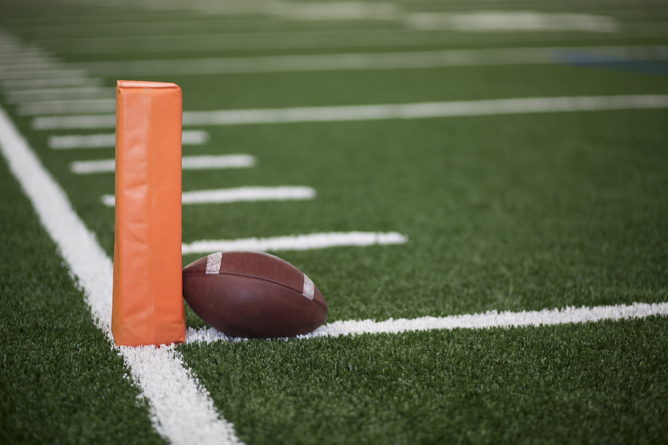 Football in the Redzone, almost a touchdown on the goal line.