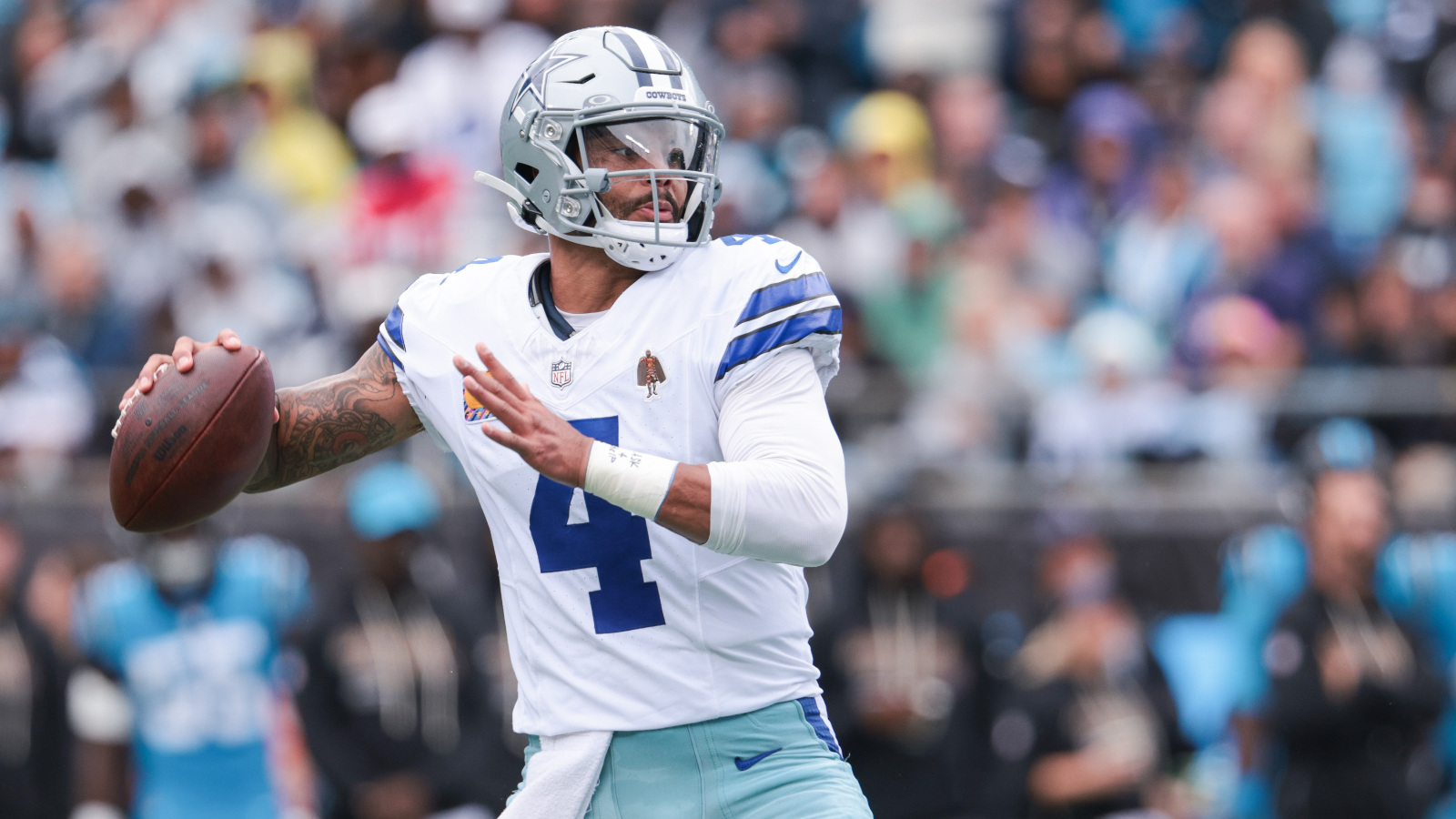 Dallas Cowboys quarterback Dak Prescott passing the ball